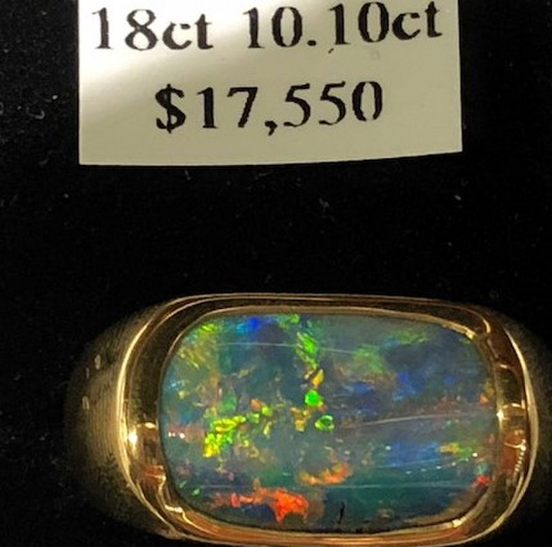 Opal ring with colors at $1,700 per carat 