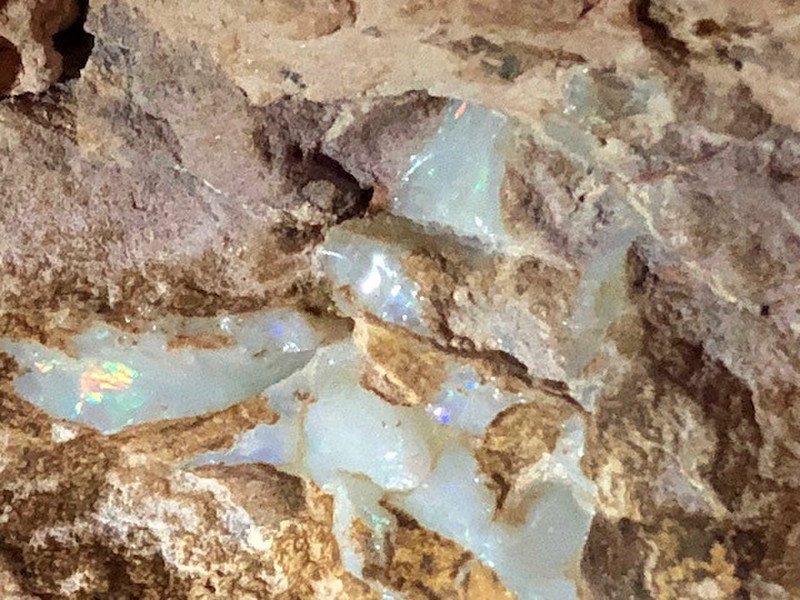 White Opal with color still in the rocks