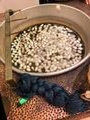 silk cocoons after boiling ready to be spun on the wheel, 