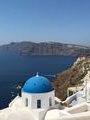 The picture of the trip - lunch shot of a Blue Dommed Church in Oia on the island of Santorini