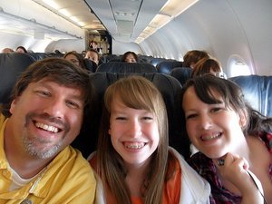 Ric Kelsie and Regan on the Plane to Paris