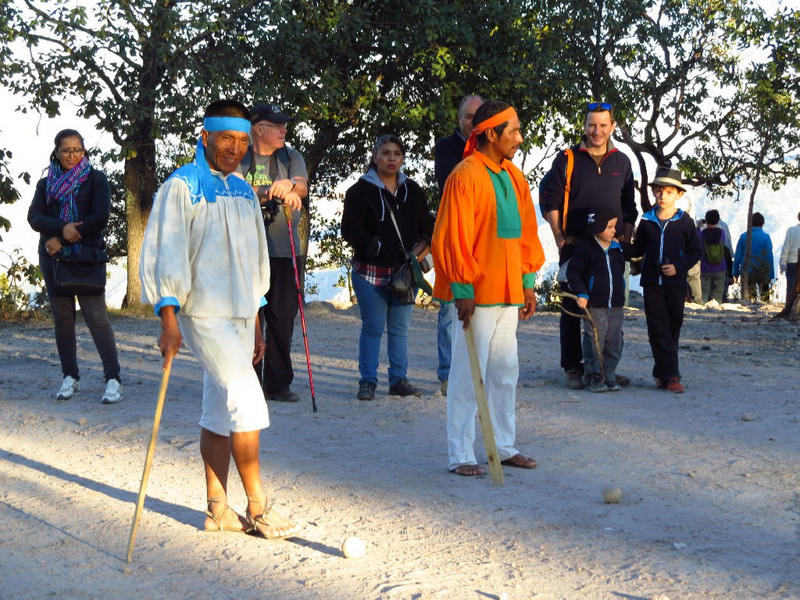 Raramuri men demonstrating the race 'ball' game