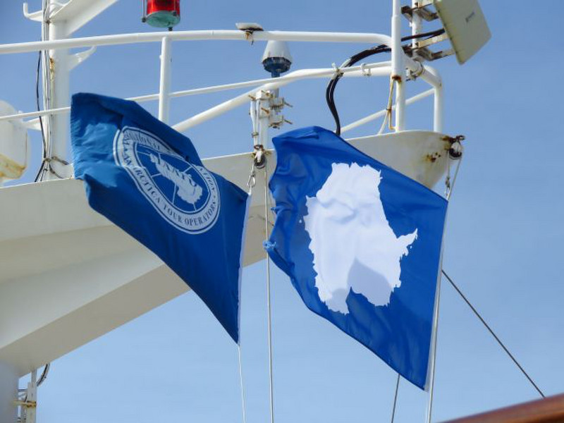 Flags to show the ship complies with requirements of the organisation which manages tourism to Antarctica