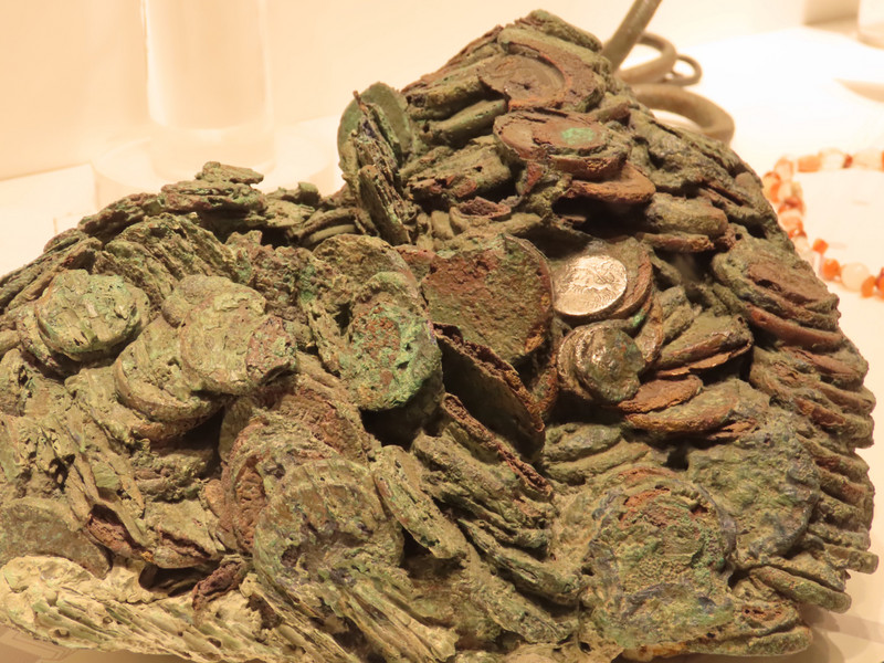 Pile of money buried in mud at Herculaneum