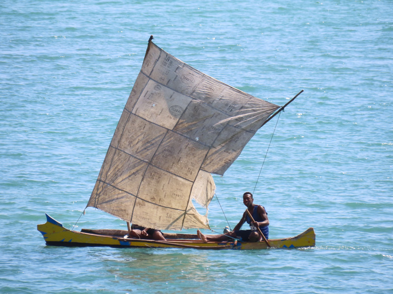 Dug out pirogue with sail