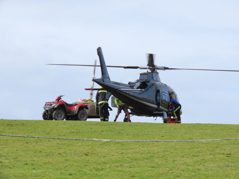 Luggage being taken from helicopter