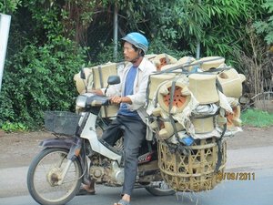 Bike carrying clay pots