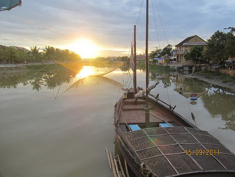 Sunset on fishing boat in Hoi An