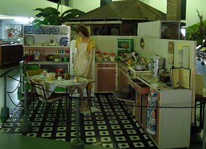 Housewife in 50s kitchen