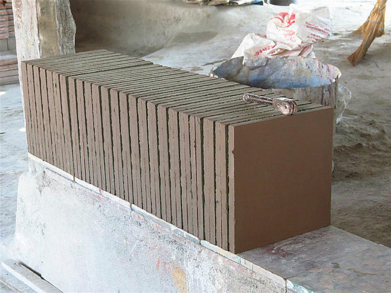 Tiles stacked to dry.