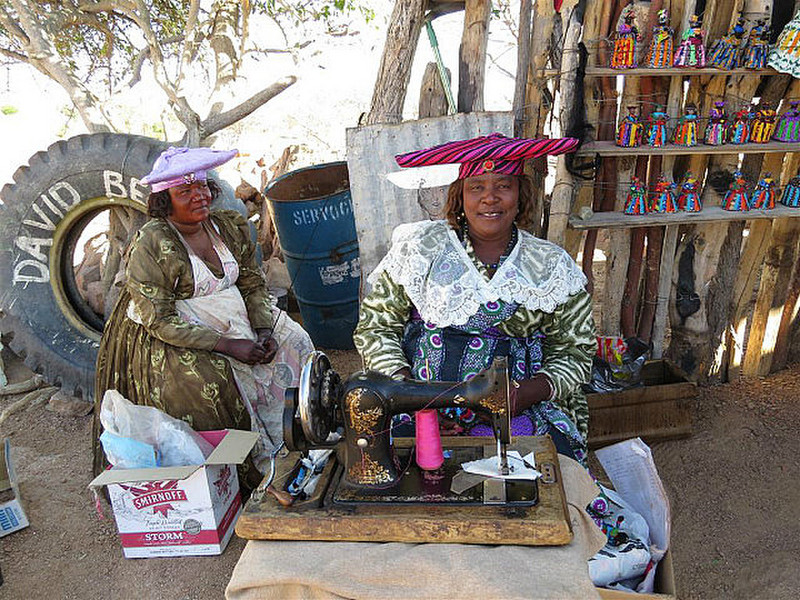 Herero women with old English made sewing machine