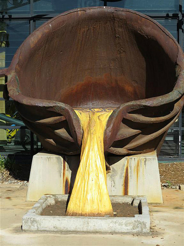 Mount Isa symbol in car park, molten copper