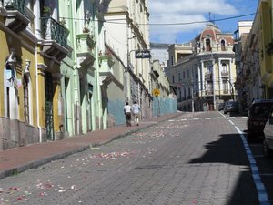 Street after procession, note strewn flower petals