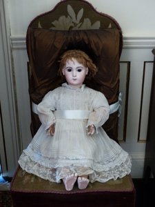 Doll from portrait still lives here