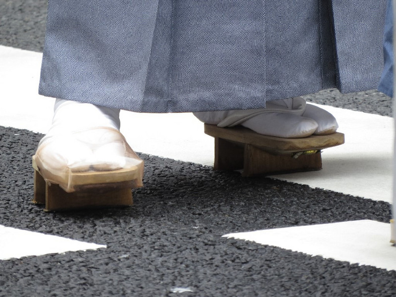 Traditional wood shoes &#39;clack&#39; as people walk.