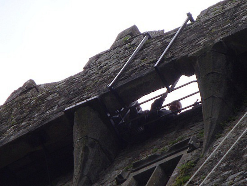 Guide waving at me from the top of Blarney Castle