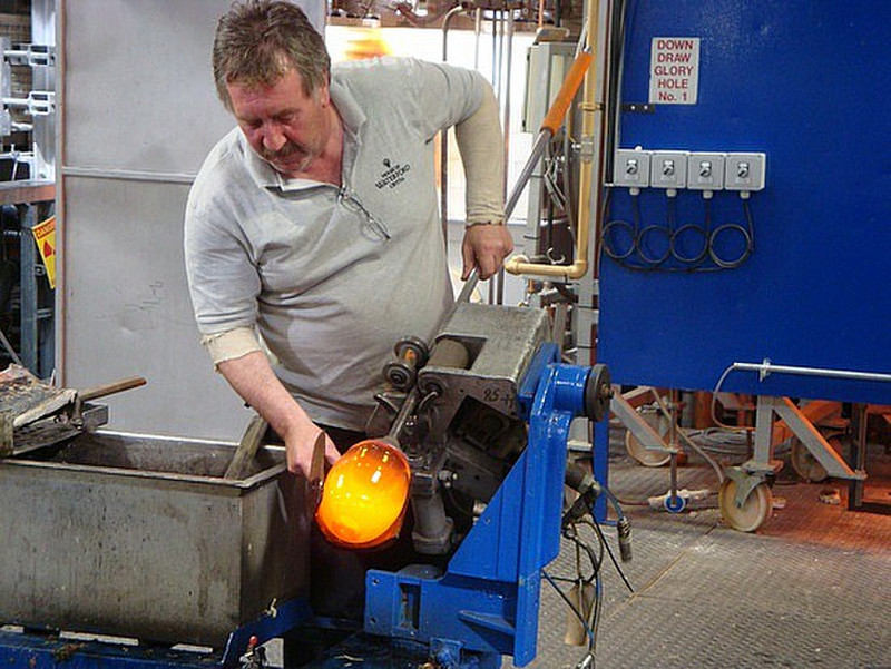 Glass Blowing room: using wooden shaper
