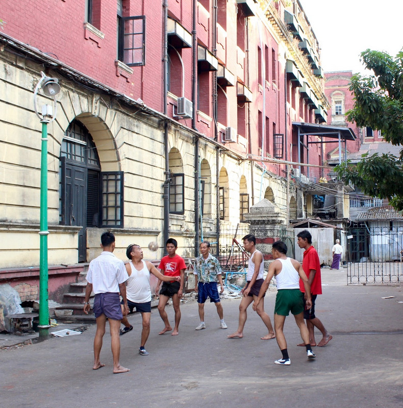 Locals playing cane ball on a sidestreet