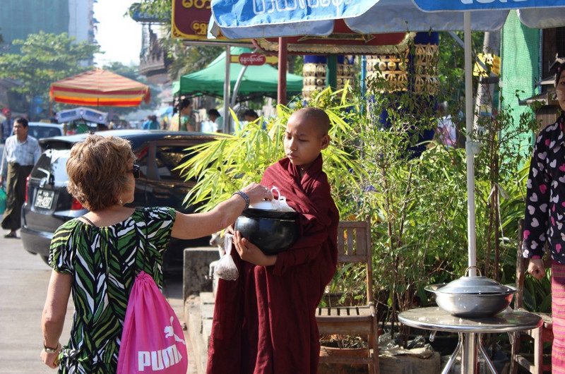 Making offerings to the young &quot;monks-in-training&quot;