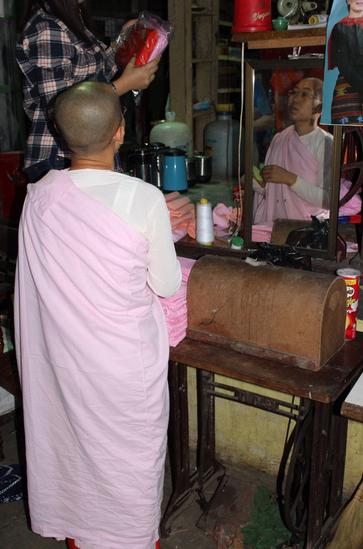 Female monk shopping