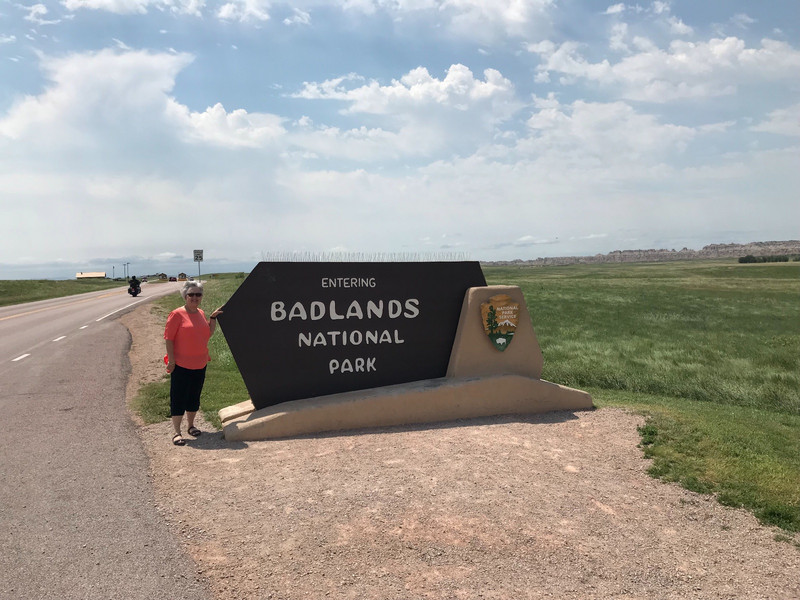 Pat at Badland’s sign