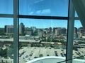 View through glass and steel support beams of the city of Winnipeg