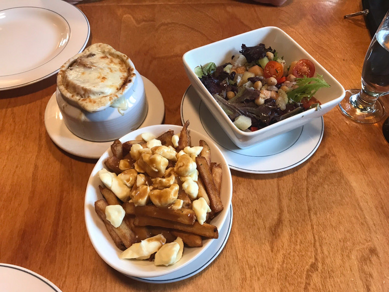 French Onion Soup, Poutine, and delicious salad