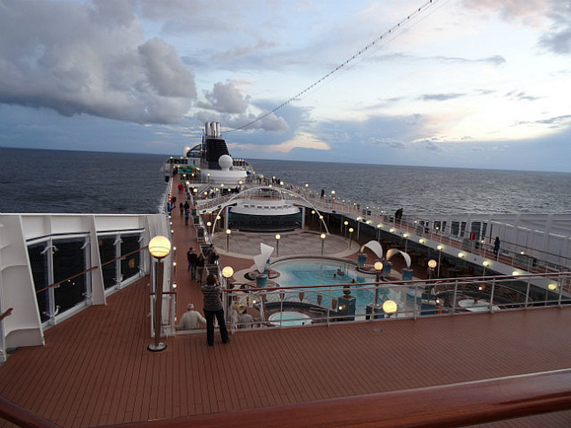 Walking the upper deck after dinner and departure