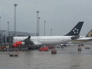 Our plane in the increasingly heavy rain...