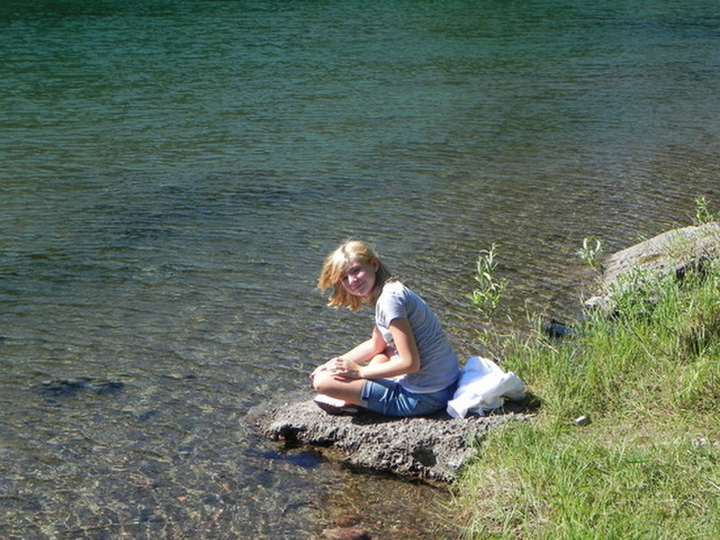 Anna on the shores of McDonald River