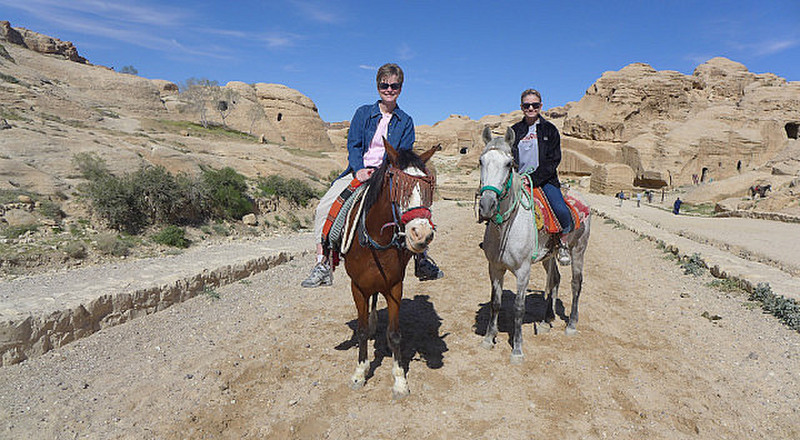 K and Anna on their horses down to the Siq Entry