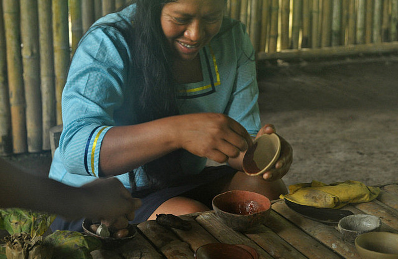 Kichwa woman paints pottery
