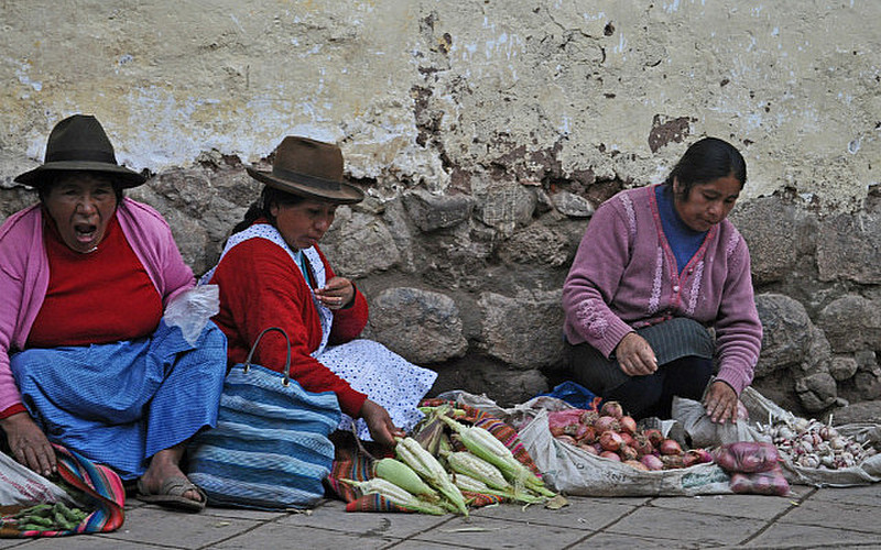 Ladies selling vegetables from their gardens