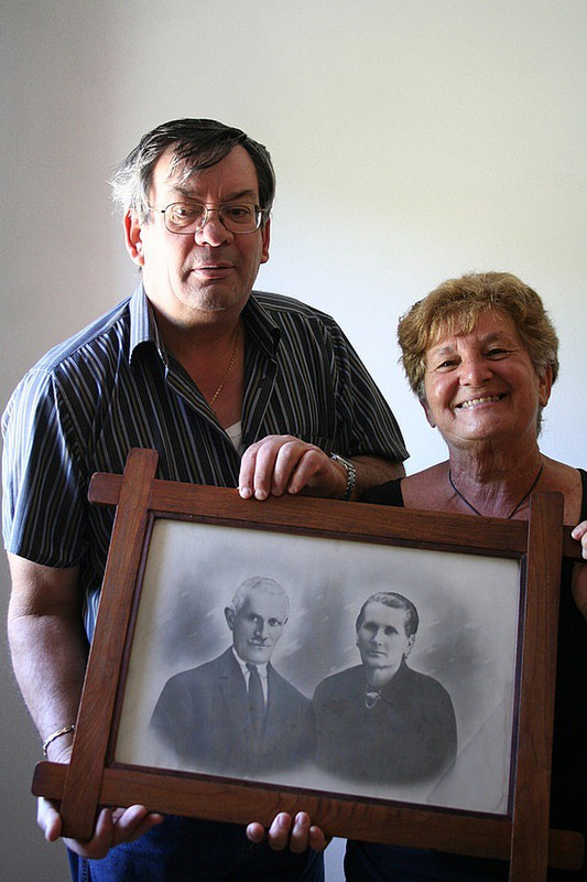 Ubaldo &amp; Rita, with a photo of their grandparents