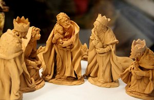 Nativity figures - Joseph holding Jesus