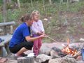 Ellen and Emily roasting marshmellow