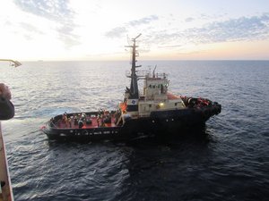 A Drift at Sea - Tug Boat arriving