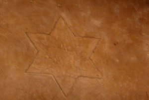 Star of David engraving in entry hall.