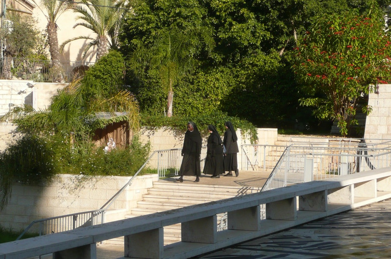 Nuns walking from one church to the other