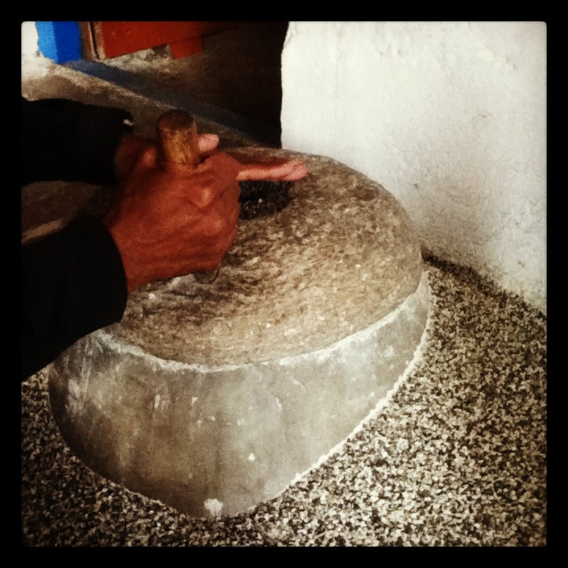 Grinding Lentil for dinner at the guesthouse