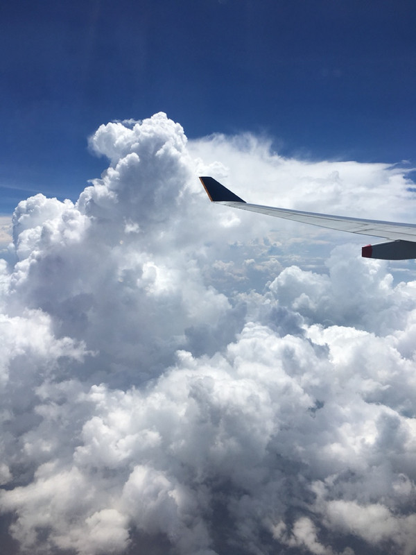 Big fluffy clouds on arrival into Singapore 