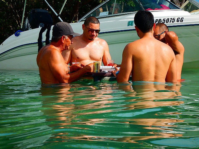 Playing dominoes in the water...floating table.