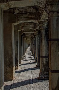 One of the long corridors that surround Angkor Wat