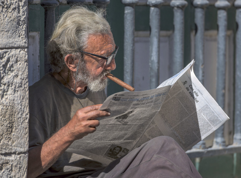 A Cigar, A Newspaper: What More Could You Want?