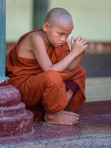 Young monk concentrating
