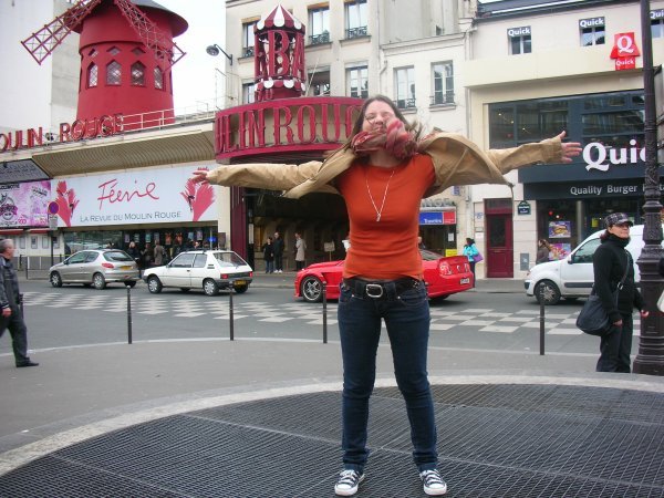 In front of the Moulin Rouge