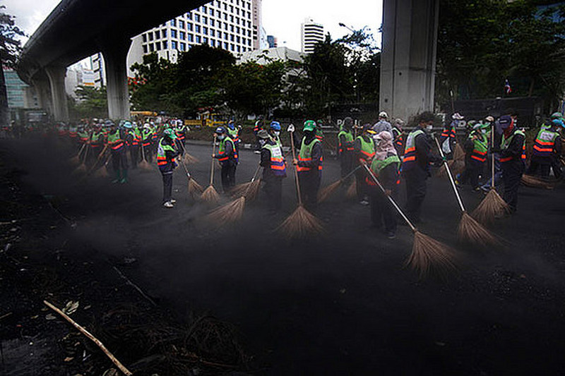 24 May  - Bangkok municipal workers with brooms