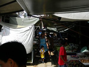 Train track under cover of tarps