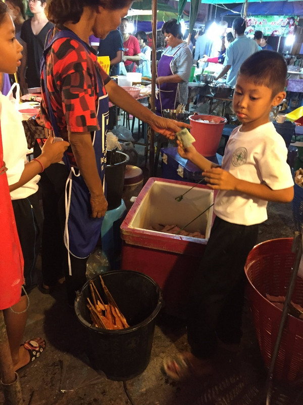 Children Helping at the Market