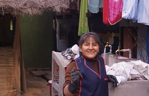 13.1338999955.huancaya-hostess-doing-laundry